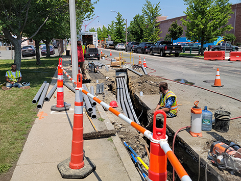 Installing (11) 4 inch ducts and (4) 1.25 inch ducts between HEX manholes C19BA-202 and relocated C19BA-203.