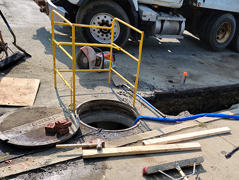 Beginning of the mainline section trench from HEX manhole C19BA-203.
