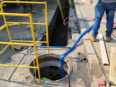 Beginning of the mainline section trench from HEX manhole C19BA-203.