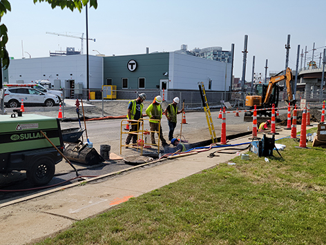 Continued excavation of the mainline trench section from HEX manhole C19BA-203.