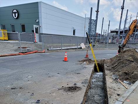 Backfilling of the completed mainline section with concrete.